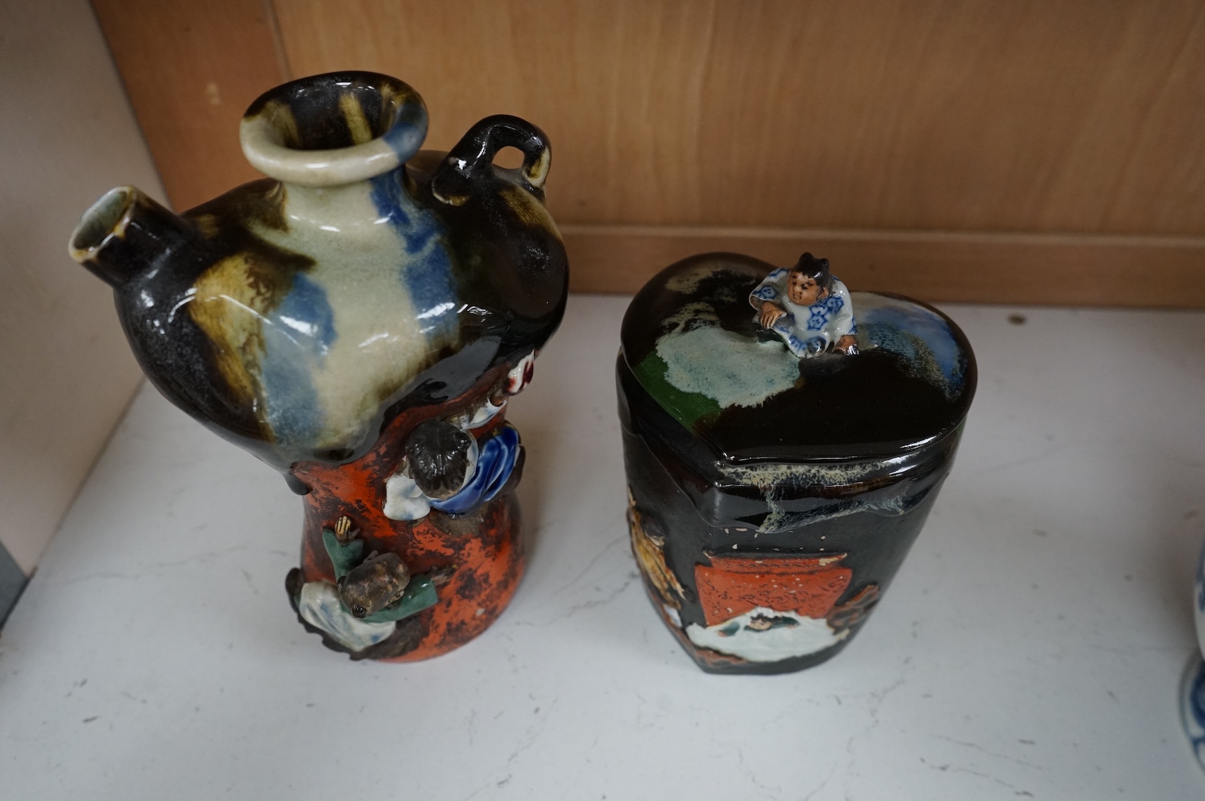 A Japanese Sumida pottery vase and a similar jar and cover, largest 21cm high